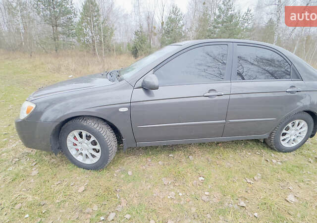 Серый Киа Черато, объемом двигателя 2 л и пробегом 180 тыс. км за 3800 $, фото 10 на Automoto.ua