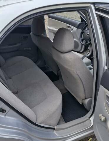 Сірий Кіа Черато, об'ємом двигуна 1.6 л та пробігом 259 тис. км за 4000 $, фото 5 на Automoto.ua