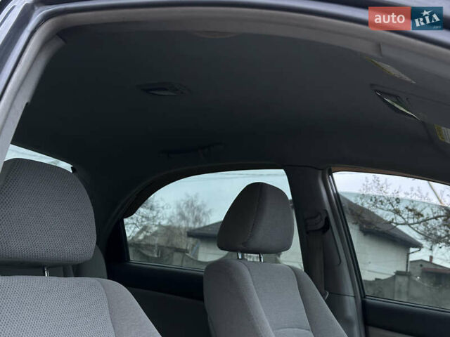 Серый Киа Черато, объемом двигателя 1.98 л и пробегом 213 тыс. км за 4900 $, фото 29 на Automoto.ua