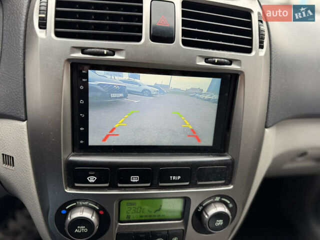 Сірий Кіа Черато, об'ємом двигуна 1.6 л та пробігом 290 тис. км за 3800 $, фото 16 на Automoto.ua