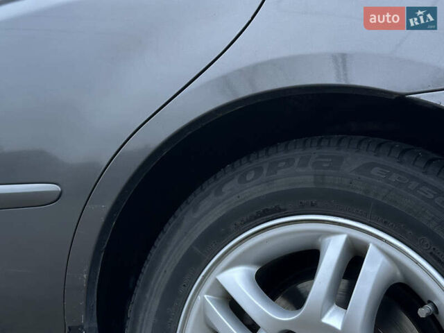 Серый Киа Черато, объемом двигателя 1.98 л и пробегом 213 тыс. км за 4900 $, фото 19 на Automoto.ua