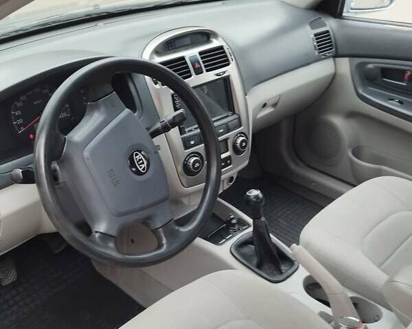 Сірий Кіа Черато, об'ємом двигуна 2 л та пробігом 230 тис. км за 3300 $, фото 11 на Automoto.ua
