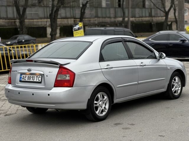 Серый Киа Черато, объемом двигателя 2 л и пробегом 240 тыс. км за 4300 $, фото 2 на Automoto.ua