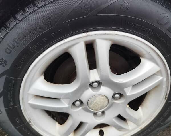 Серый Киа Черато, объемом двигателя 1.6 л и пробегом 200 тыс. км за 3550 $, фото 4 на Automoto.ua