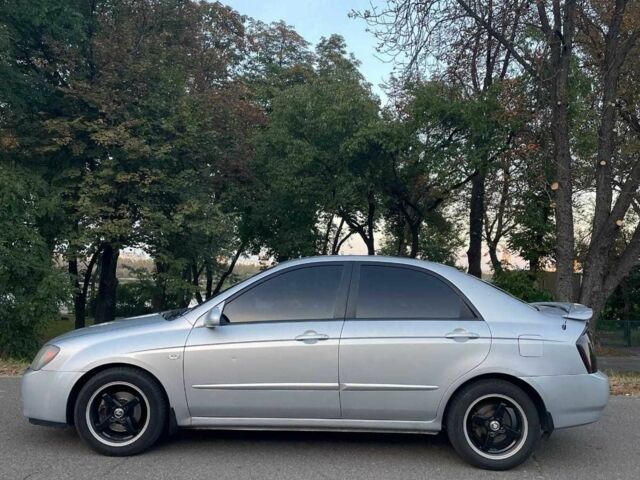 Сірий Кіа Черато, об'ємом двигуна 2 л та пробігом 350 тис. км за 4100 $, фото 2 на Automoto.ua