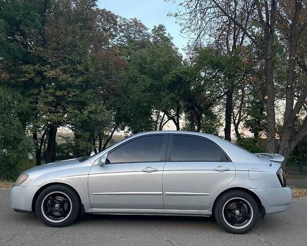 Сірий Кіа Черато, об'ємом двигуна 2 л та пробігом 350 тис. км за 4100 $, фото 1 на Automoto.ua
