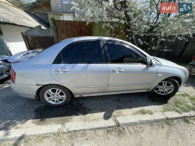 Сірий Кіа Черато, об'ємом двигуна 1.6 л та пробігом 180 тис. км за 4300 $, фото 2 на Automoto.ua