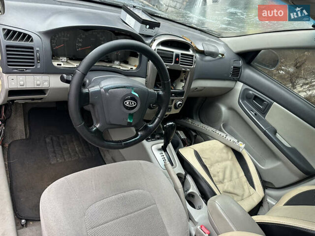 Сірий Кіа Черато, об'ємом двигуна 2 л та пробігом 280 тис. км за 2100 $, фото 17 на Automoto.ua