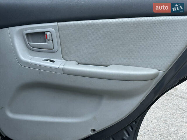 Серый Киа Черато, объемом двигателя 1.98 л и пробегом 213 тыс. км за 4900 $, фото 18 на Automoto.ua