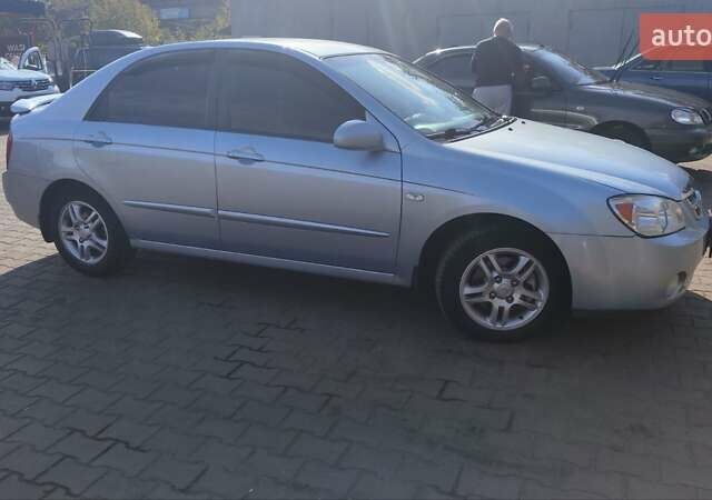 Серый Киа Черато, объемом двигателя 1.98 л и пробегом 255 тыс. км за 4300 $, фото 7 на Automoto.ua