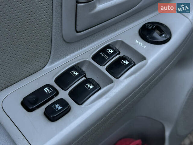 Серый Киа Черато, объемом двигателя 1.98 л и пробегом 213 тыс. км за 4900 $, фото 9 на Automoto.ua