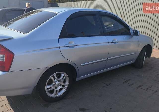 Серый Киа Черато, объемом двигателя 1.98 л и пробегом 255 тыс. км за 4300 $, фото 3 на Automoto.ua