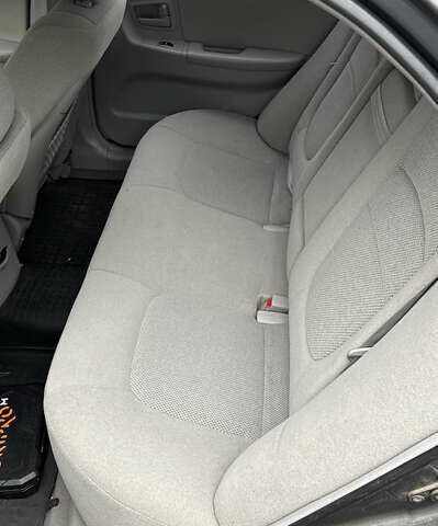 Серый Киа Черато, объемом двигателя 2 л и пробегом 180 тыс. км за 3800 $, фото 13 на Automoto.ua