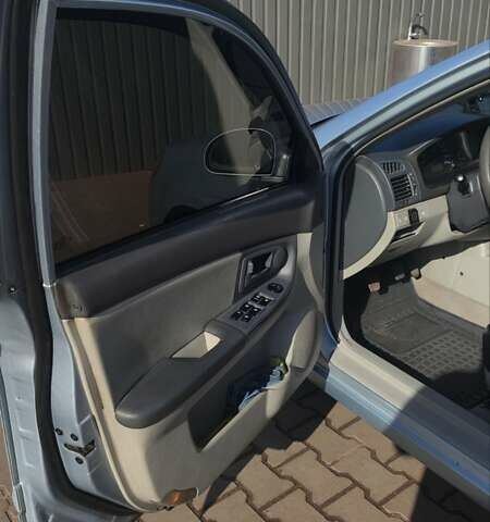 Серый Киа Черато, объемом двигателя 1.98 л и пробегом 255 тыс. км за 4300 $, фото 12 на Automoto.ua