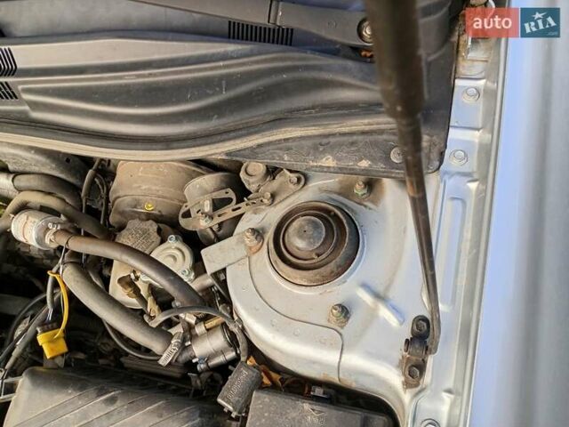 Серый Киа Черато, объемом двигателя 1.59 л и пробегом 184 тыс. км за 4100 $, фото 6 на Automoto.ua