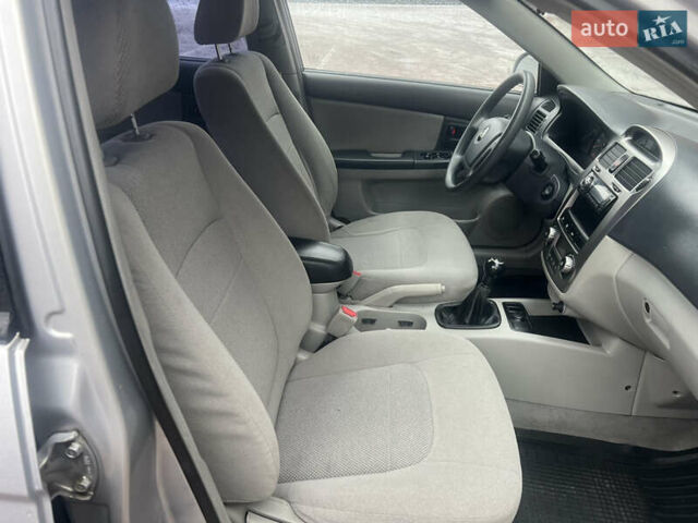 Серый Киа Черато, объемом двигателя 1.98 л и пробегом 260 тыс. км за 3950 $, фото 41 на Automoto.ua