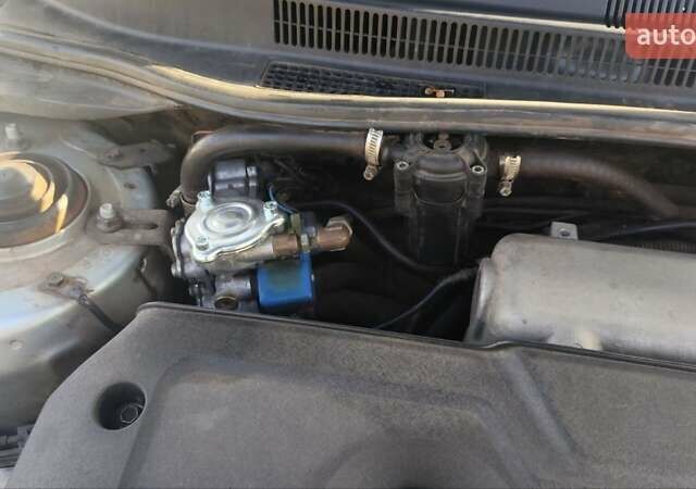 Серый Киа Черато, объемом двигателя 1.98 л и пробегом 255 тыс. км за 4300 $, фото 33 на Automoto.ua