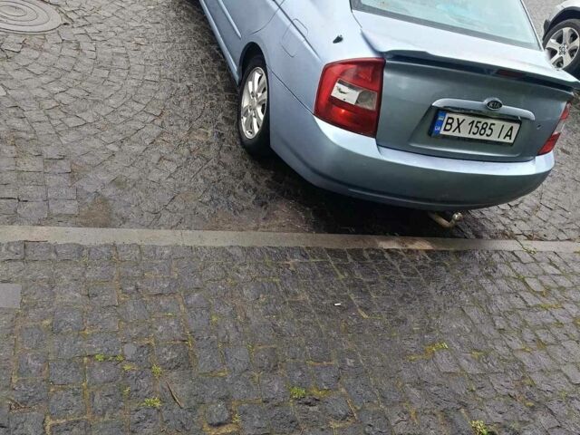 Серый Киа Черато, объемом двигателя 2 л и пробегом 230 тыс. км за 3000 $, фото 5 на Automoto.ua