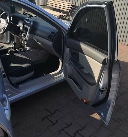 Серый Киа Черато, объемом двигателя 1.98 л и пробегом 255 тыс. км за 4300 $, фото 15 на Automoto.ua