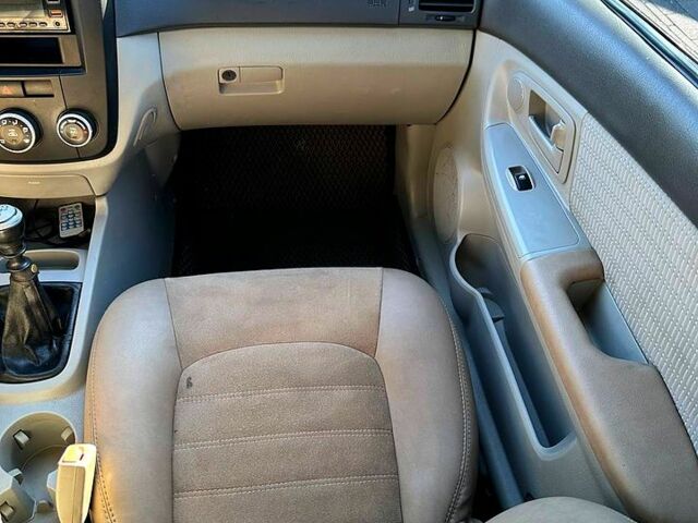 Серый Киа Черато, объемом двигателя 1.6 л и пробегом 325 тыс. км за 2999 $, фото 4 на Automoto.ua