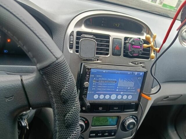 Серый Киа Черато, объемом двигателя 2 л и пробегом 230 тыс. км за 3000 $, фото 1 на Automoto.ua