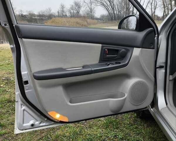 Сірий Кіа Черато, об'ємом двигуна 1.6 л та пробігом 45 тис. км за 6999 $, фото 15 на Automoto.ua