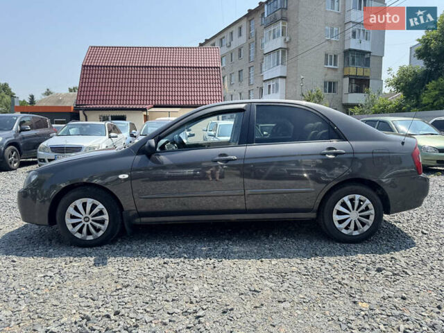 Серый Киа Черато, объемом двигателя 1.59 л и пробегом 244 тыс. км за 3400 $, фото 5 на Automoto.ua