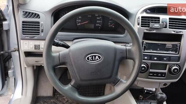 Серый Киа Черато, объемом двигателя 1.98 л и пробегом 240 тыс. км за 3000 $, фото 17 на Automoto.ua