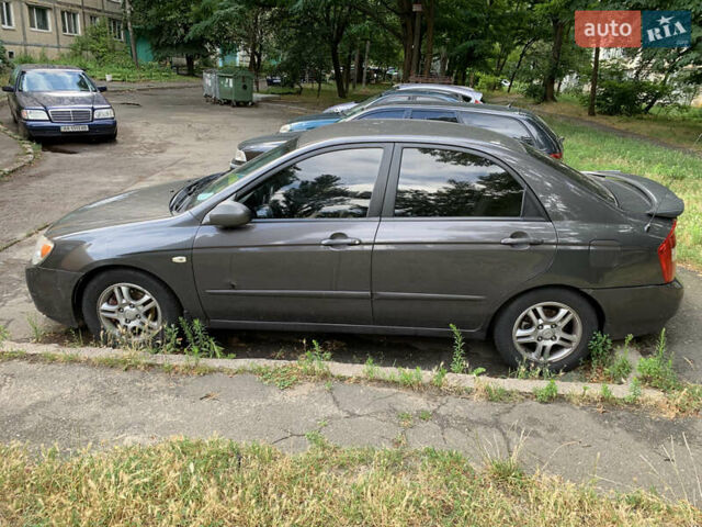 Сірий Кіа Черато, об'ємом двигуна 1.98 л та пробігом 259 тис. км за 3800 $, фото 3 на Automoto.ua