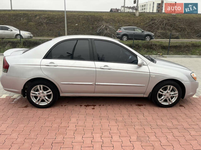 Сірий Кіа Черато, об'ємом двигуна 1.6 л та пробігом 235 тис. км за 3999 $, фото 6 на Automoto.ua