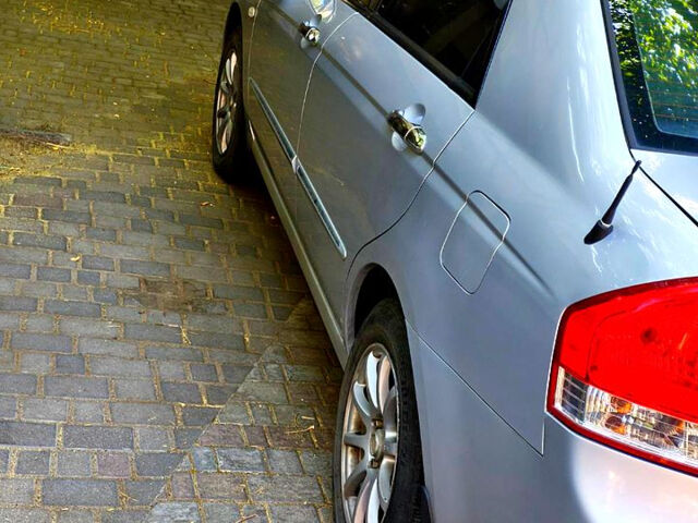 Серый Киа Черато, объемом двигателя 2 л и пробегом 186 тыс. км за 5800 $, фото 5 на Automoto.ua