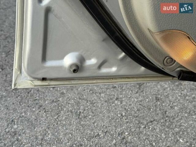 Сірий Кіа Черато, об'ємом двигуна 2 л та пробігом 202 тис. км за 4600 $, фото 19 на Automoto.ua
