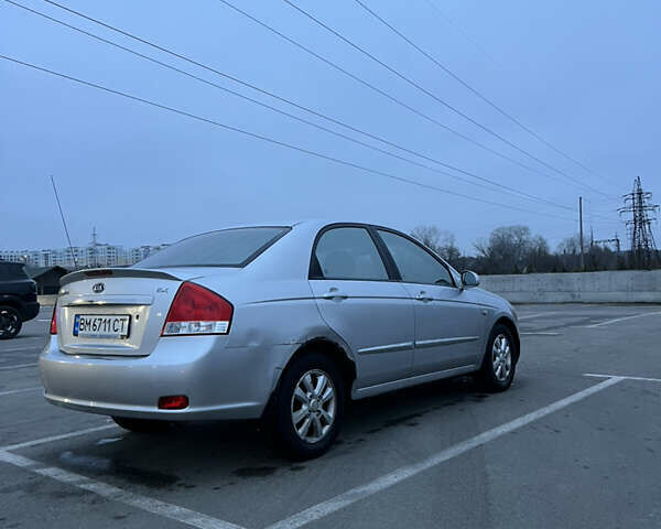 Серый Киа Черато, объемом двигателя 2 л и пробегом 326 тыс. км за 4200 $, фото 3 на Automoto.ua