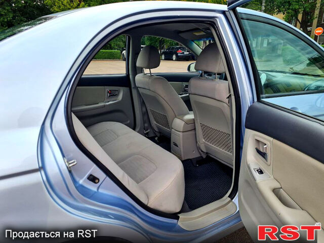 Серый Киа Черато, объемом двигателя 1.6 л и пробегом 265 тыс. км за 4999 $, фото 5 на Automoto.ua