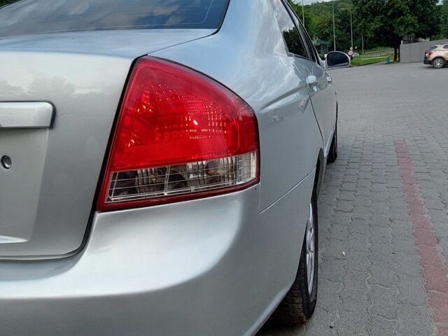 Сірий Кіа Черато, об'ємом двигуна 1.6 л та пробігом 385 тис. км за 3700 $, фото 3 на Automoto.ua