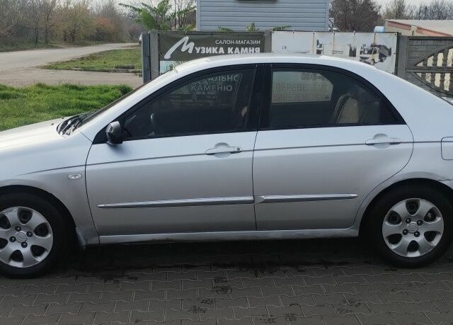 Серый Киа Черато, объемом двигателя 1.6 л и пробегом 296 тыс. км за 3900 $, фото 5 на Automoto.ua