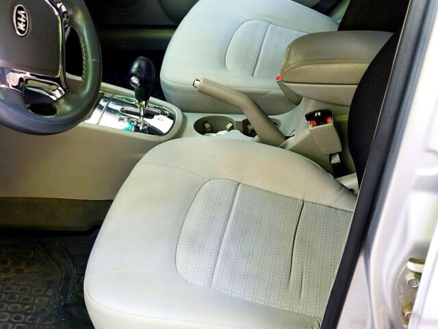 Серый Киа Черато, объемом двигателя 2 л и пробегом 186 тыс. км за 5800 $, фото 8 на Automoto.ua