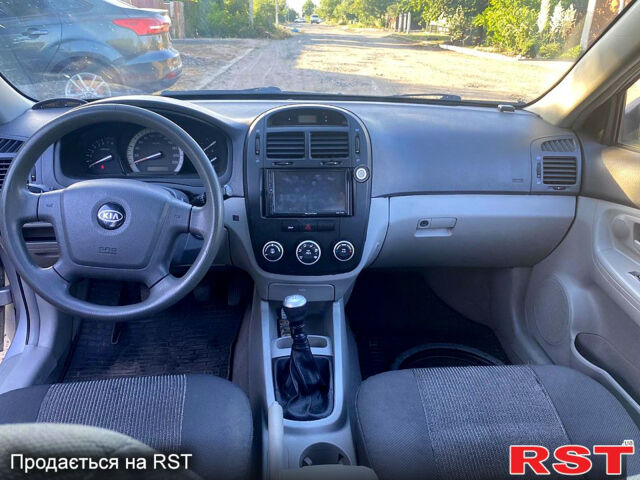 Серый Киа Черато, объемом двигателя 1.6 л и пробегом 228 тыс. км за 4300 $, фото 5 на Automoto.ua