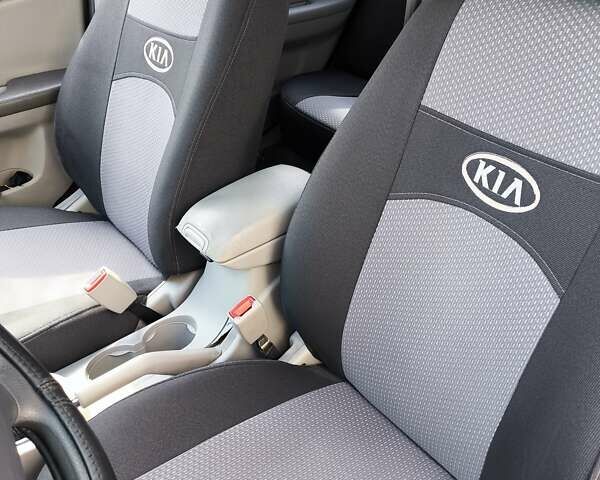 Серый Киа Черато, объемом двигателя 1.6 л и пробегом 218 тыс. км за 4500 $, фото 11 на Automoto.ua