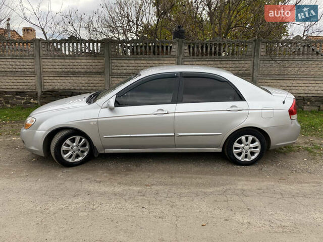 Серый Киа Черато, объемом двигателя 1.6 л и пробегом 294 тыс. км за 4250 $, фото 17 на Automoto.ua