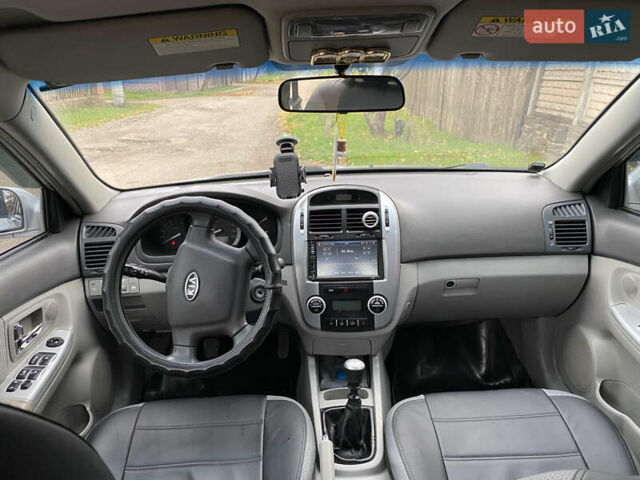 Серый Киа Черато, объемом двигателя 1.6 л и пробегом 294 тыс. км за 4250 $, фото 7 на Automoto.ua