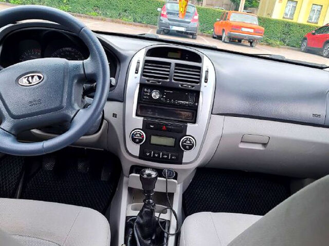 Серый Киа Черато, объемом двигателя 1.6 л и пробегом 265 тыс. км за 4999 $, фото 6 на Automoto.ua