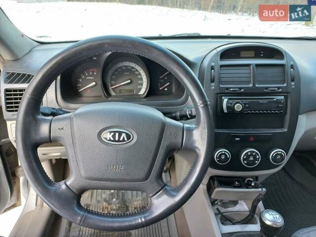 Серый Киа Черато, объемом двигателя 1.58 л и пробегом 472 тыс. км за 4800 $, фото 7 на Automoto.ua
