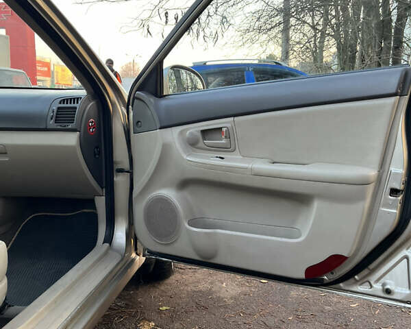 Серый Киа Черато, объемом двигателя 1.6 л и пробегом 268 тыс. км за 3900 $, фото 5 на Automoto.ua