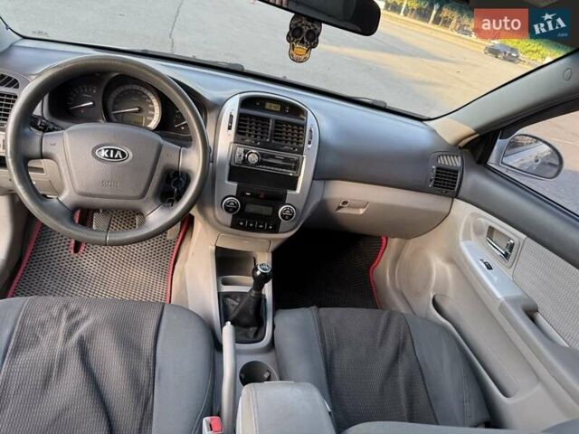 Сірий Кіа Черато, об'ємом двигуна 2 л та пробігом 202 тис. км за 4600 $, фото 35 на Automoto.ua