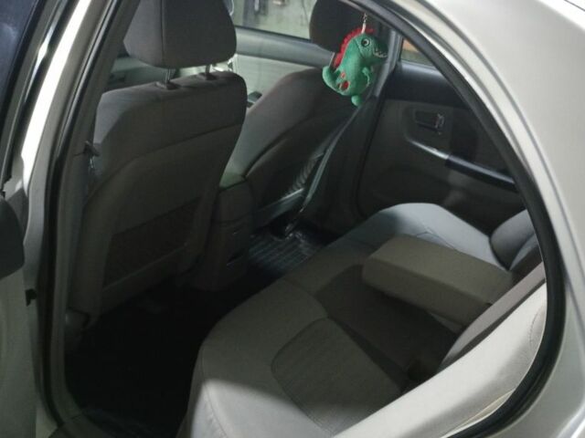 Серый Киа Черато, объемом двигателя 2 л и пробегом 165 тыс. км за 4600 $, фото 3 на Automoto.ua