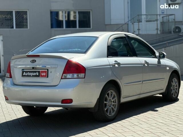 Серый Киа Черато, объемом двигателя 2 л и пробегом 186 тыс. км за 5940 $, фото 4 на Automoto.ua