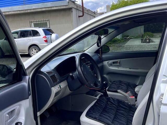 Сірий Кіа Черато, об'ємом двигуна 1.6 л та пробігом 260 тис. км за 5300 $, фото 8 на Automoto.ua