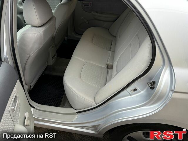 Серый Киа Черато, объемом двигателя 1.6 л и пробегом 250 тыс. км за 4200 $, фото 11 на Automoto.ua