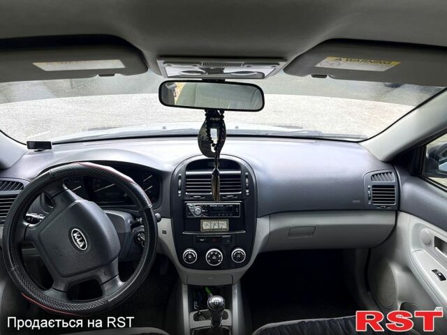 Сірий Кіа Черато, об'ємом двигуна 1.6 л та пробігом 260 тис. км за 5300 $, фото 7 на Automoto.ua